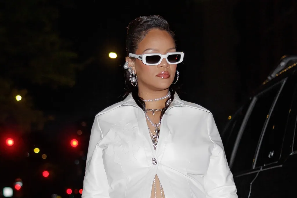 Rihanna styling rimless Chrome Hearts eyewear casually